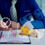 A man's hand on a broker house