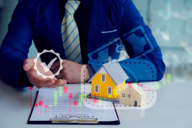 A man's hand on a broker house