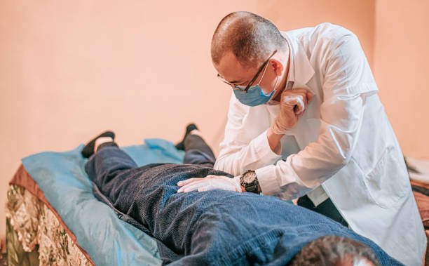 using his elbow strength on male patient shiatsu