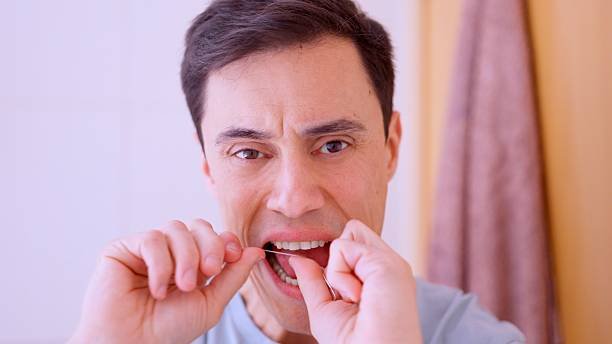 My Floss Stinks: Understanding Causes and Effective Solutions for Fresh Oral Hygiene